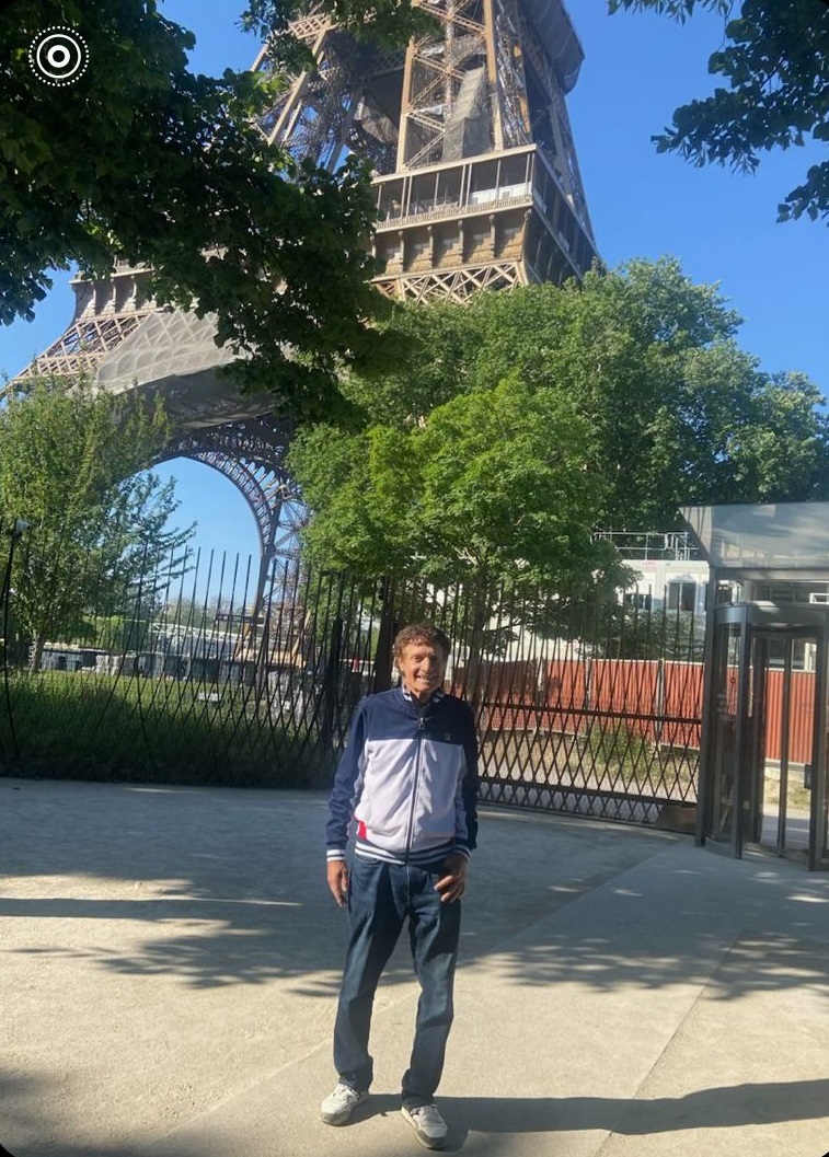  Marshall Hubsher standing in front of the Eiffel Tower on June 2, 2023